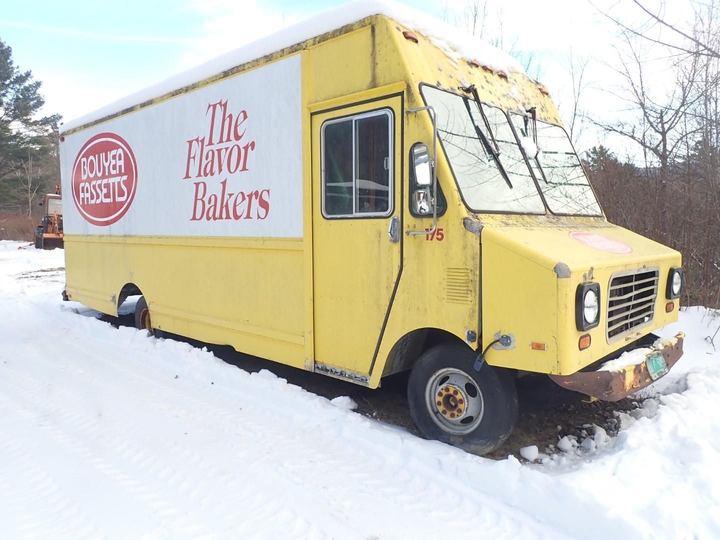 Yellow Flavor Bakers work truck in snow.