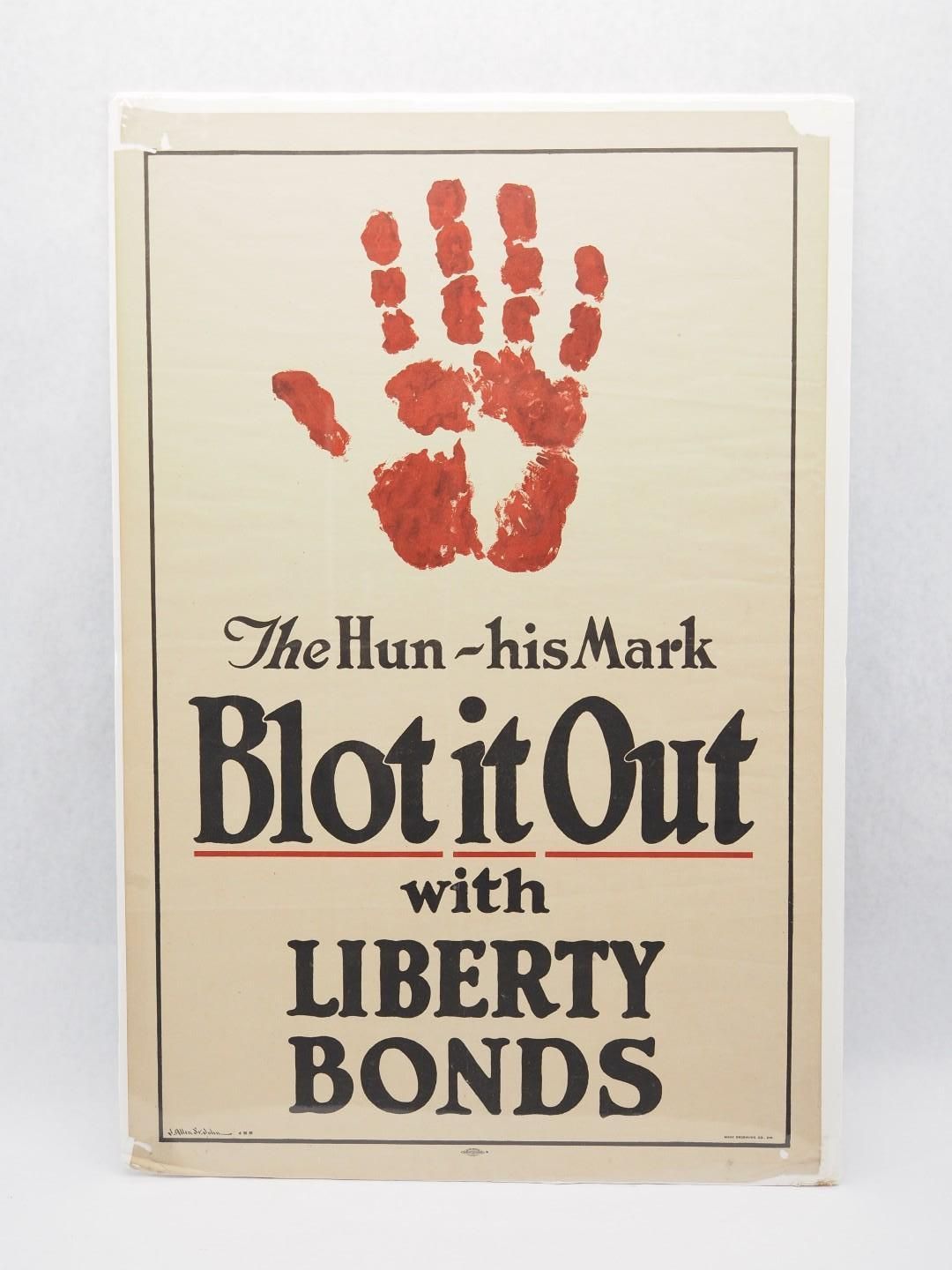 Anti-Hitler poster with red handprint and the slogan “Blot it Out with Liberty Bonds”