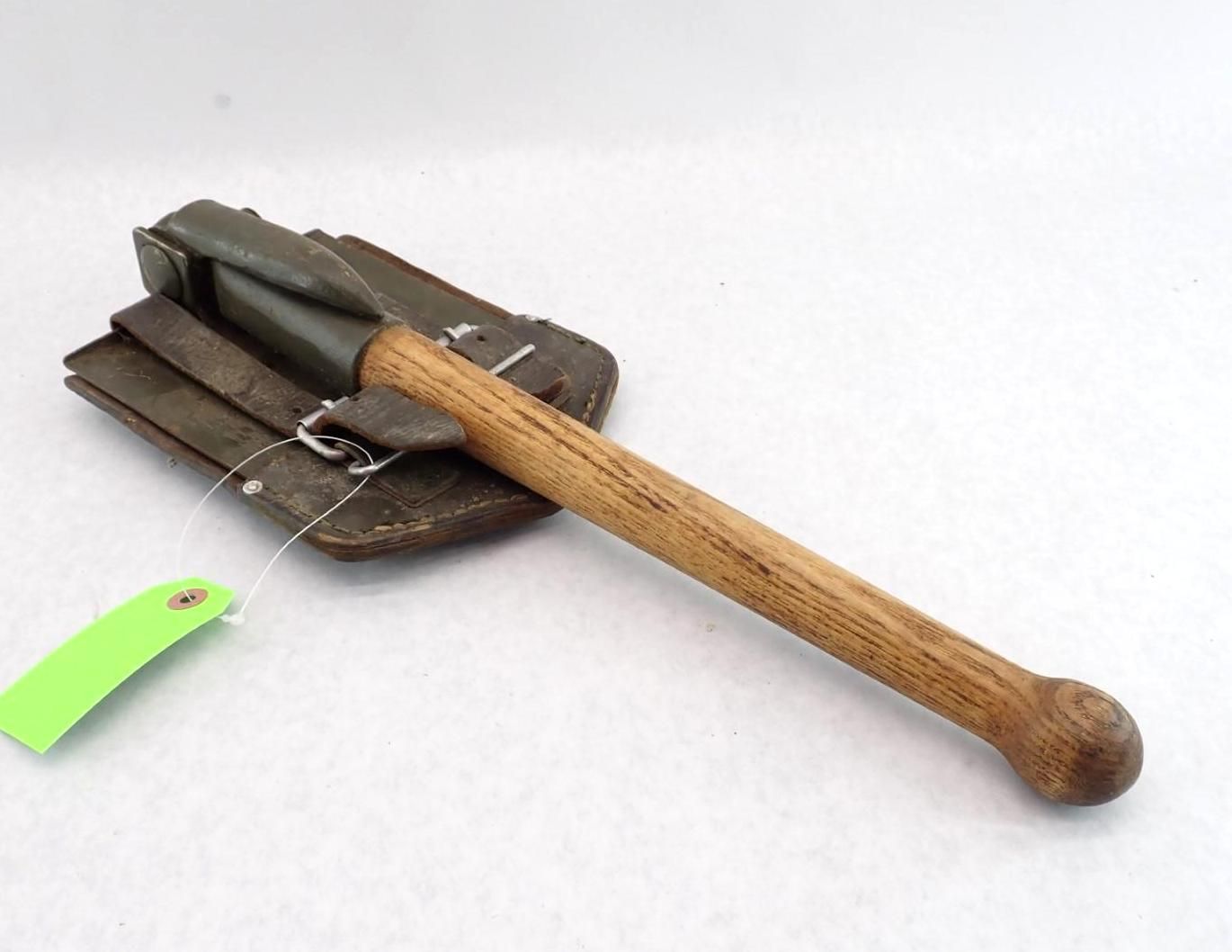 German Model 24 Stielhandgranate grenade with wooden handle and carrying pouch.