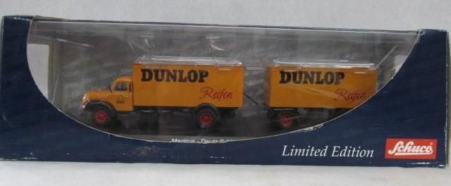 Toy truck with yellow trailers and
