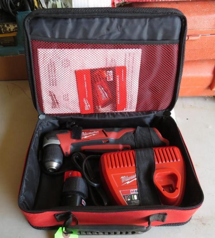 Milwaukee right angle drill, charger, and battery in a red zippered case.