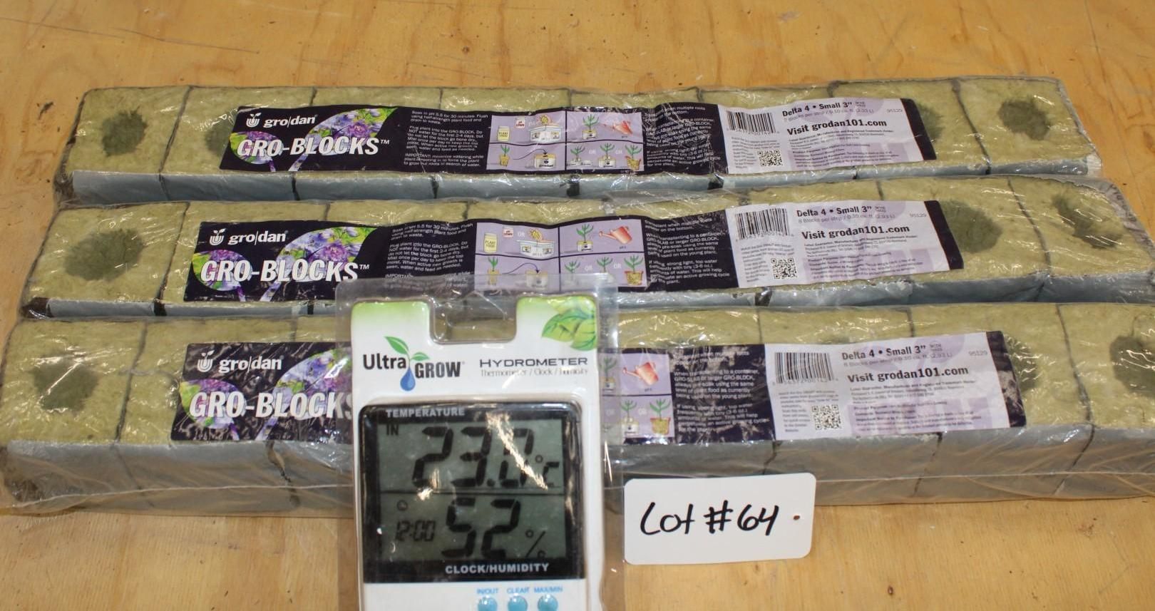 Three wrapped rectangular grow block packages, a thermometer, and a