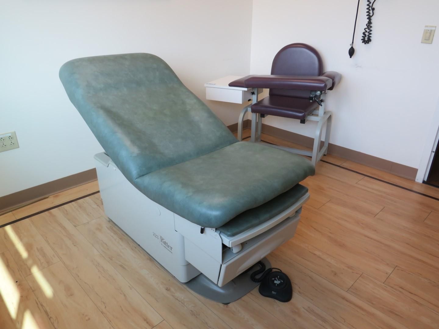 Examination room with medical exam chair.