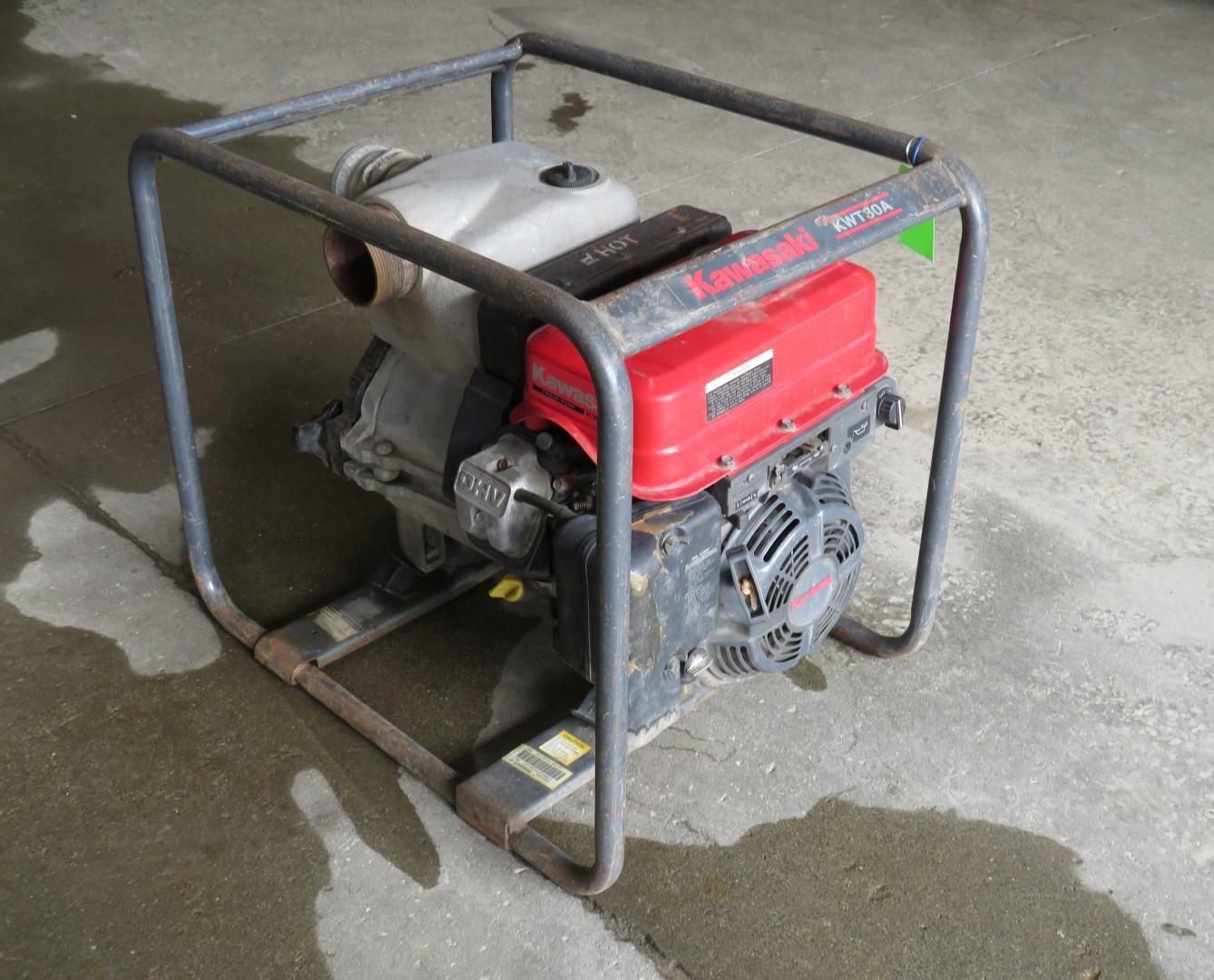Water pump with red and gray engine, metal frame.