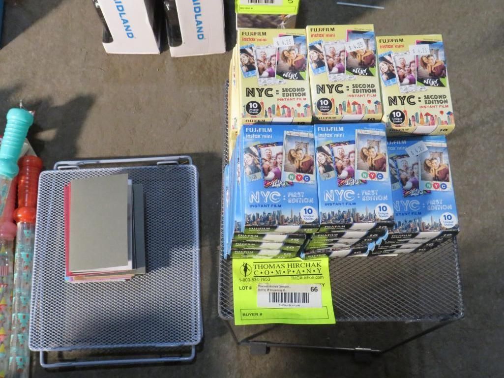 Desk organizers with notebooks, cards, and boxes.