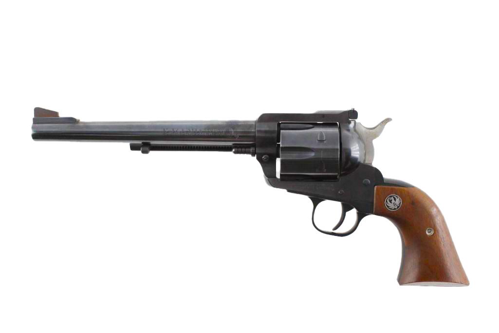 Black revolver pistol with wood handle, barrel pointing to the left.