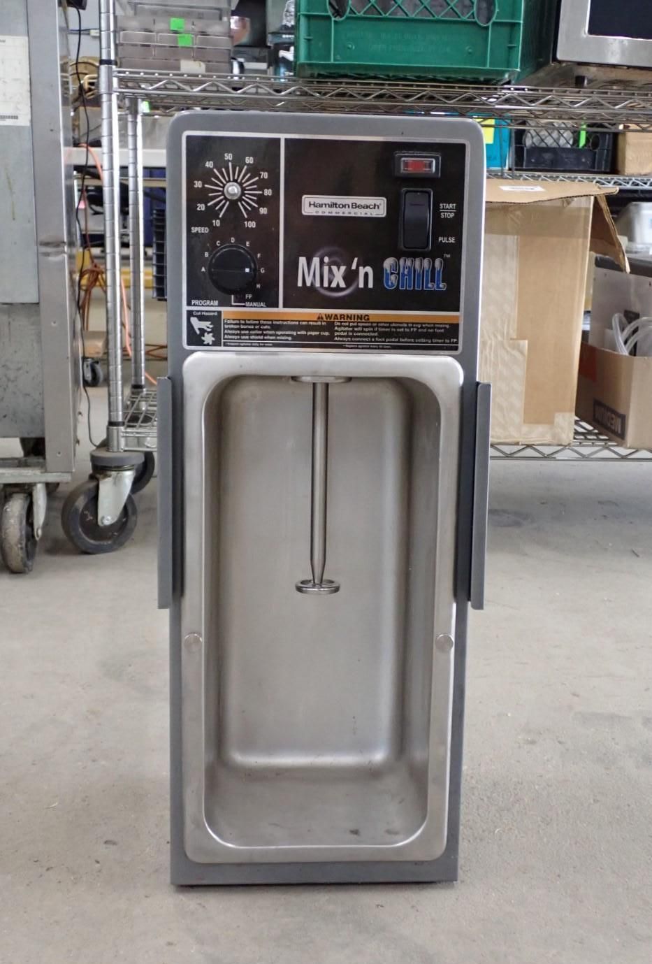 A stainless steel Mix'n Swirl milkshake machine with controls on top.