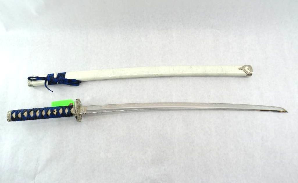 Katana sword with a white scabbard and blue handle.