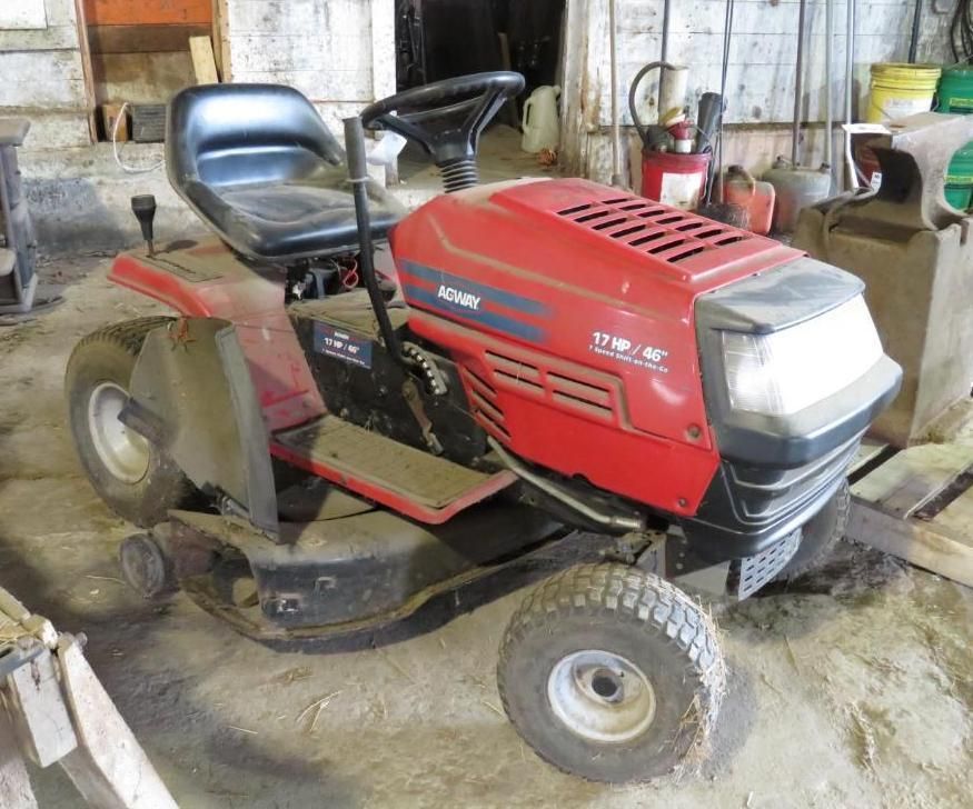 Red and black Craftsman riding lawn mower.