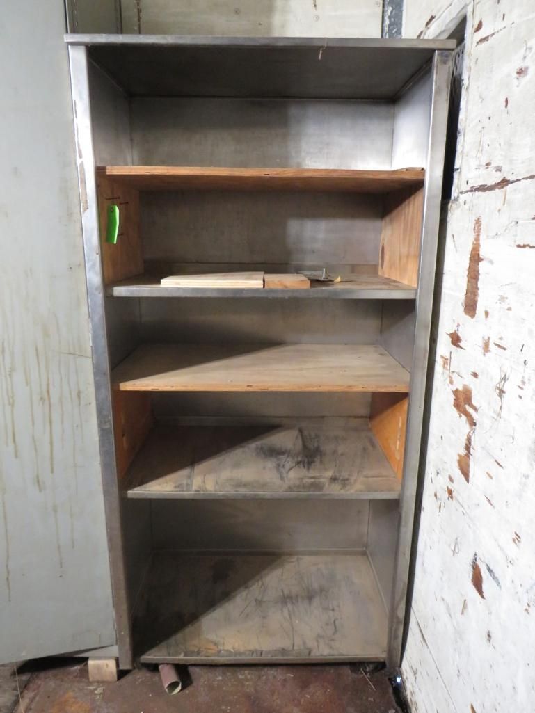 Stainless steel shelving unit with four shelves; wooden shelves inside a metal frame.