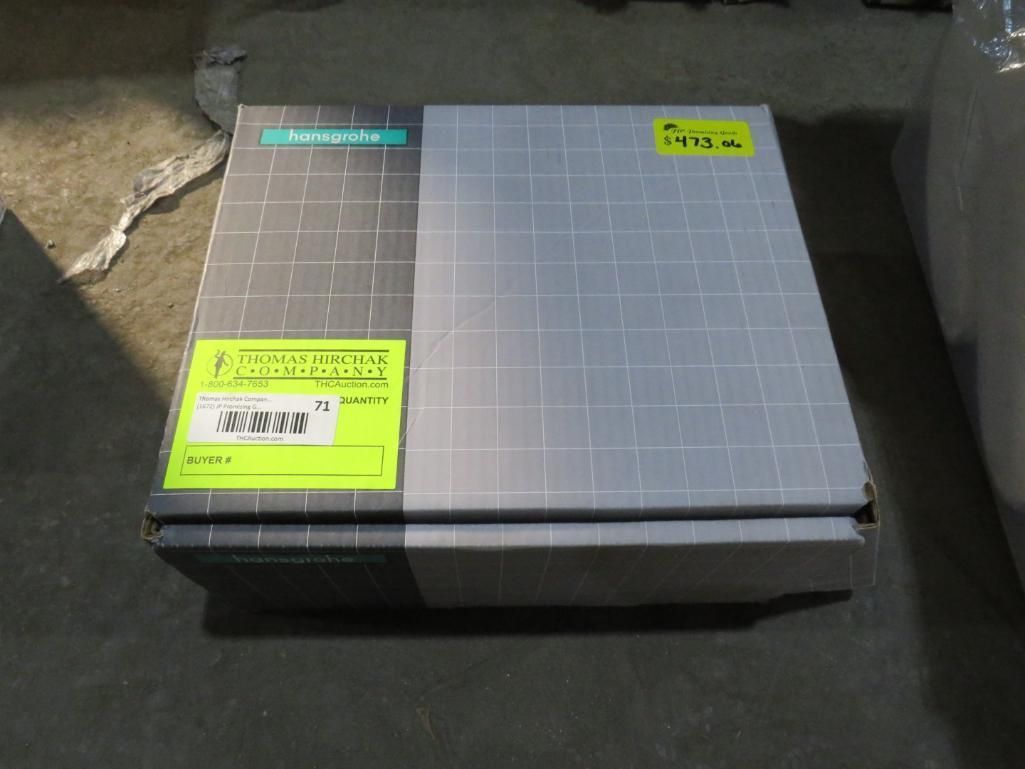 A box with gray and green design. A neon yellow sticker on the front.