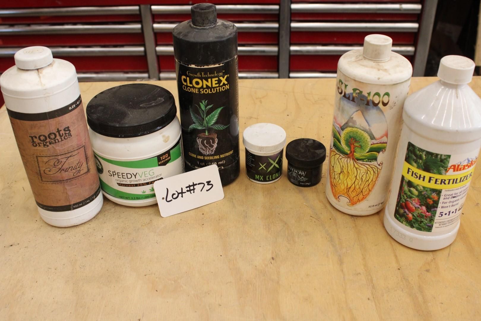 Bottles of gardening products labeled as