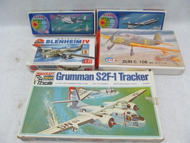 Model airplane kits: Grumman Tracker, Blenheim IV, Zlin C. 106, and others. Boxes are colorful, with plane illustrations.