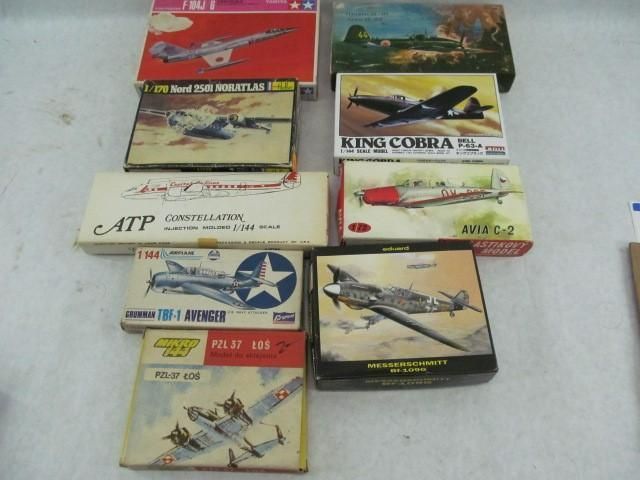 Assortment of vintage model airplane kits in their original boxes.