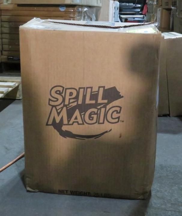 Cardboard box of Spill Magic absorbent granules in a warehouse.