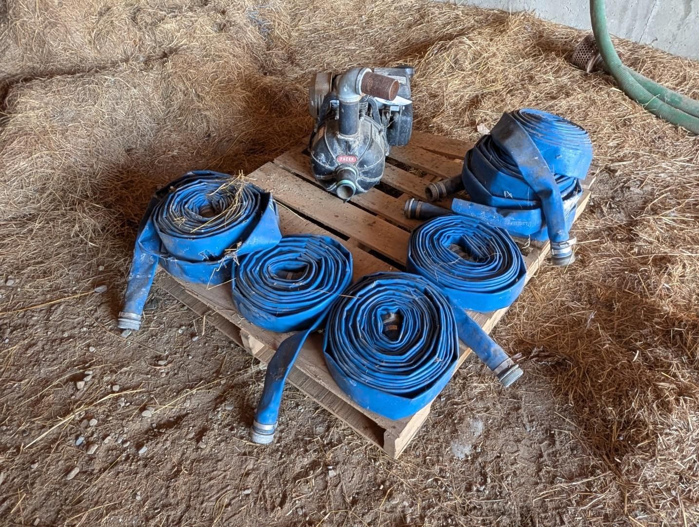 Coiled blue straps and a small device on cardboard