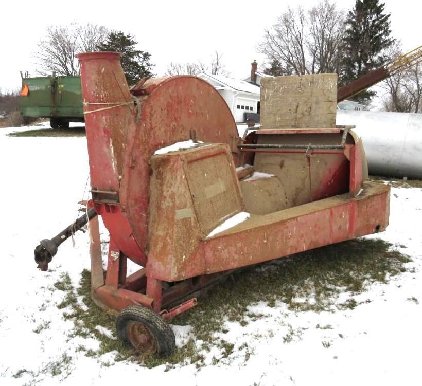 Red hay chopper machine.