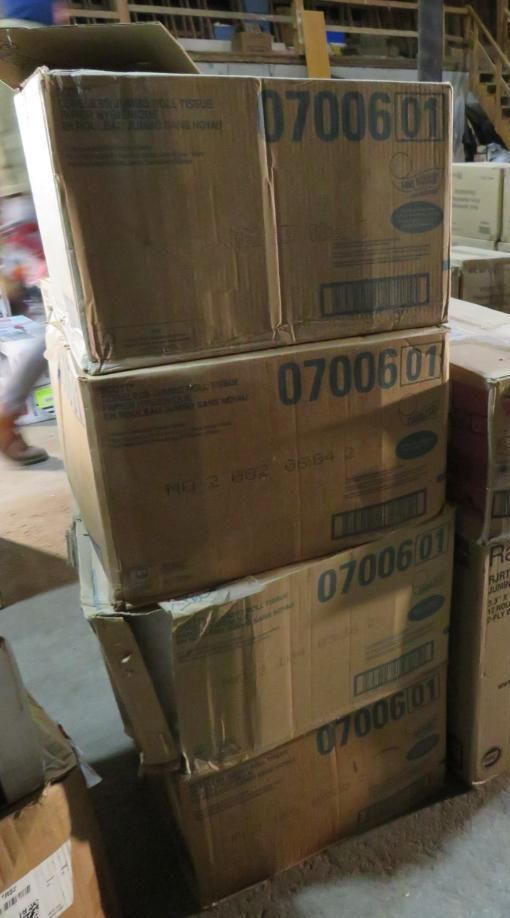 Four stacked cardboard boxes.