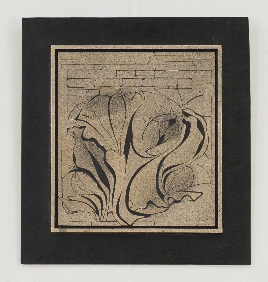 Abstract floral artwork in black and beige, mounted in a black square frame.