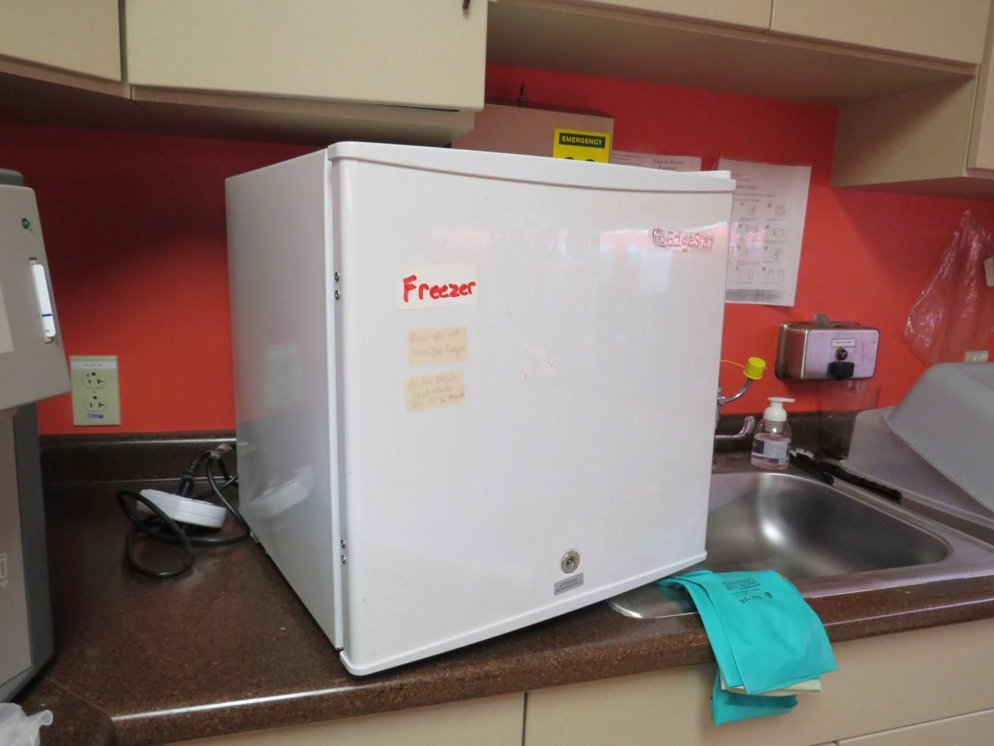 White freezer labeled
