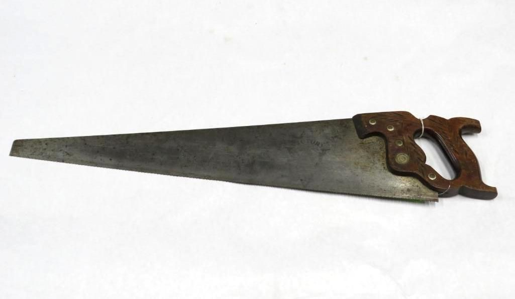 Hand saw with wooden handle against a white background.