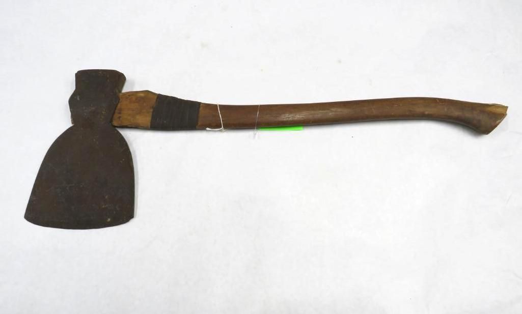 Axe with wooden handle.