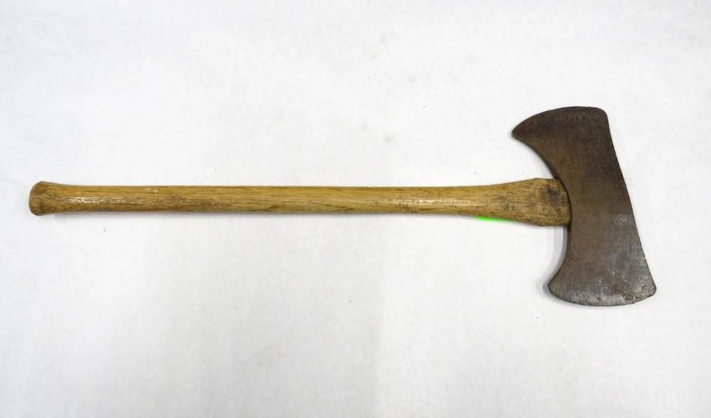 Double-headed axe with wooden handle against a white backdrop.