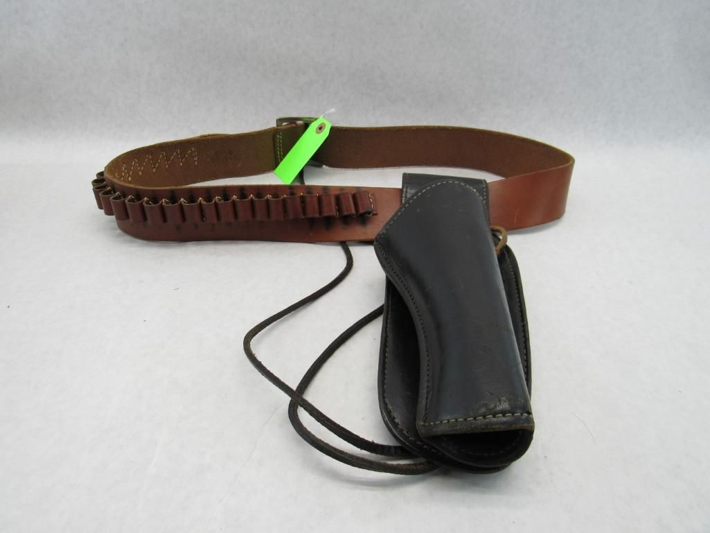 Brown leather belt with bullet loops and black leather holster.