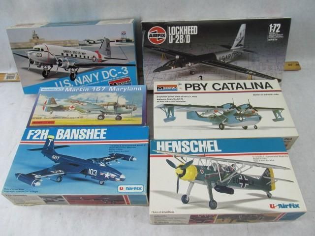 Six model airplane boxes: DC-3, F-26, Banshee, Catalina, Henschel, and Skyray.