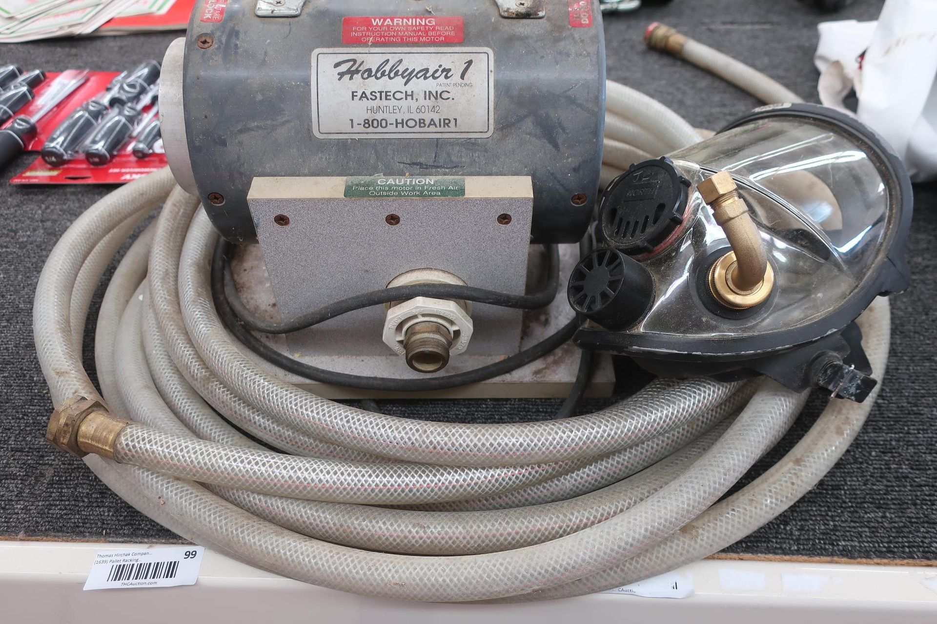 Gray Hobbyair airbrush system with hose and respirator.