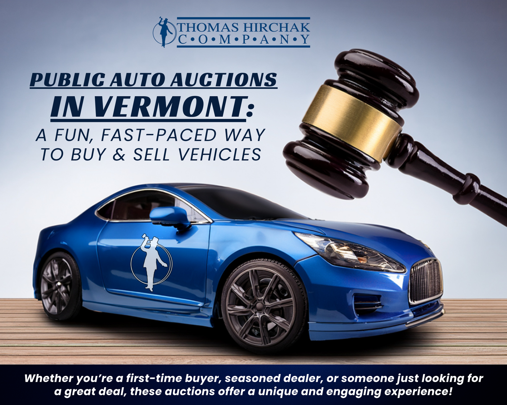 Blue sports car on a wood floor with a large wooden auction gavel and Thomas Hirchak Company logo.