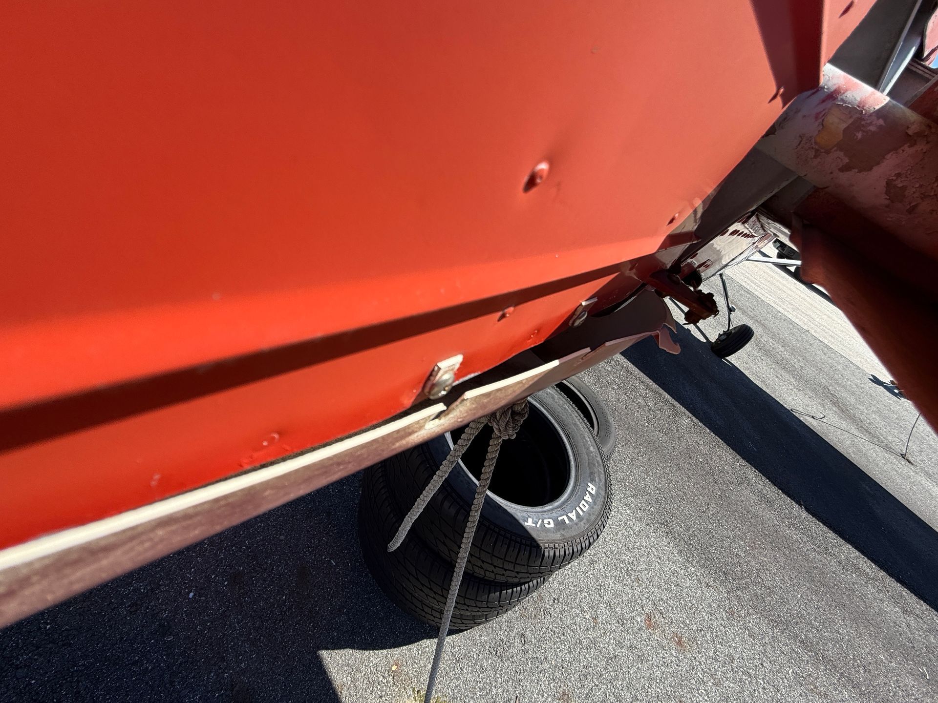 Close-up of a red plane's side panel