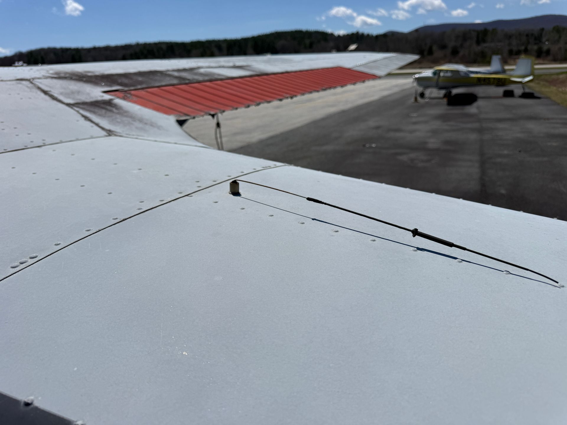 White aircraft rooftop with red accents