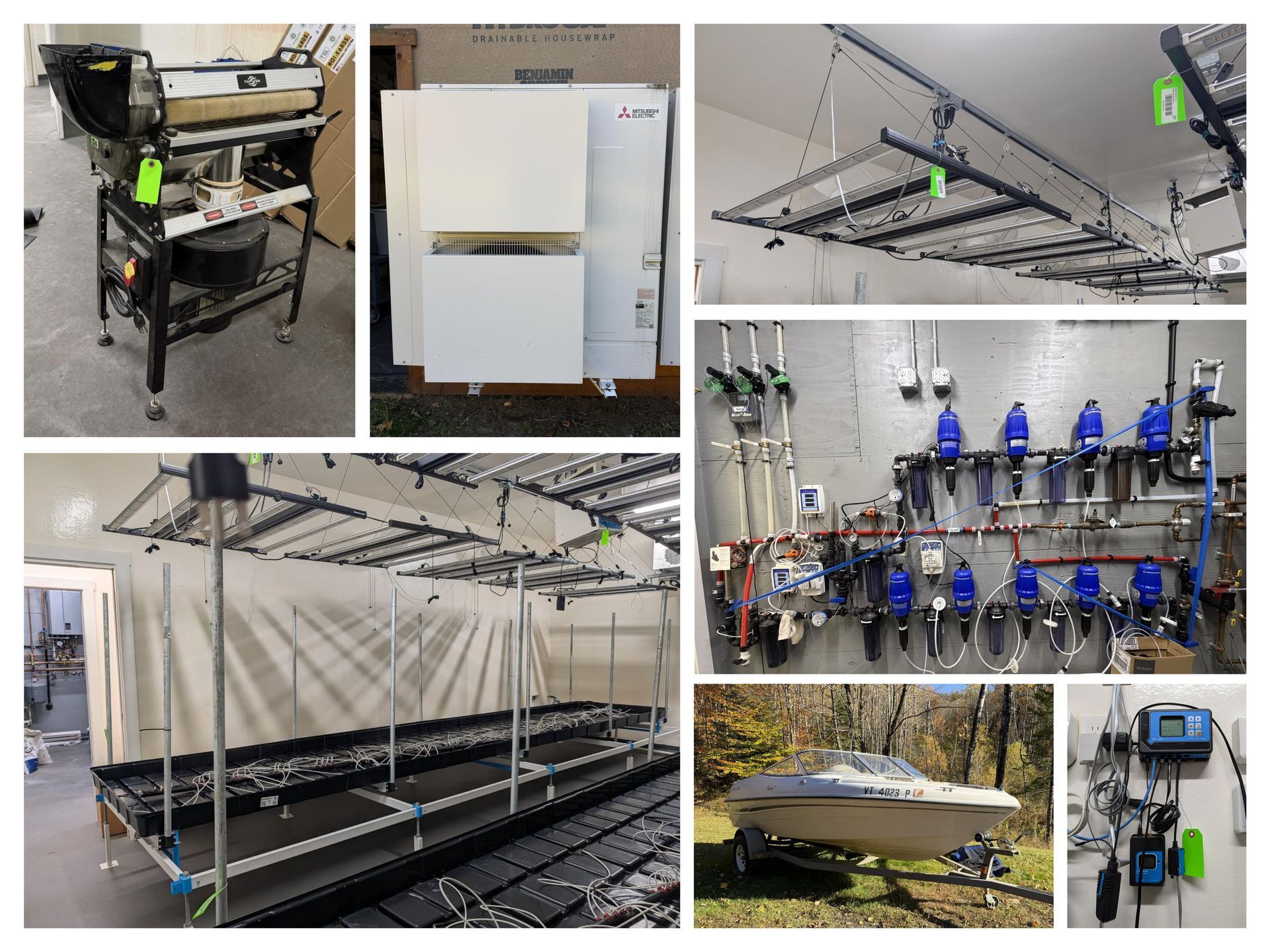 Greenhouse hydroponic grow system with shelves, pipes, and blue nutrient tanks in a lab setup
