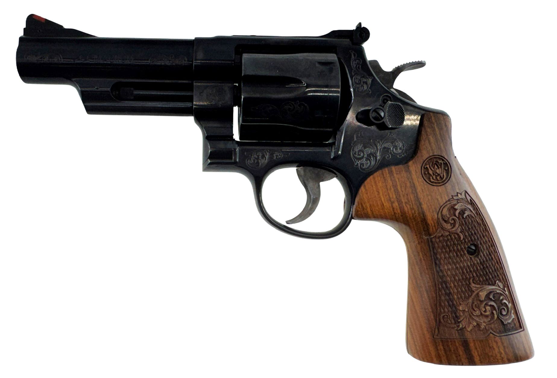 Black revolver with a wooden grip on a white background