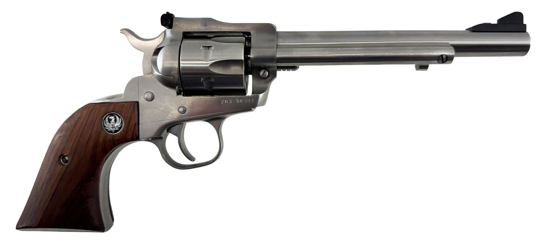 Silver revolver with wooden grip on a white background
