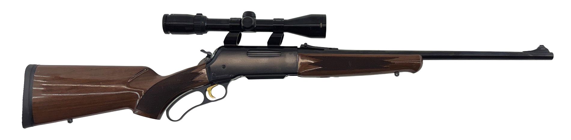 Wooden bolt-action rifle with scope on a white background