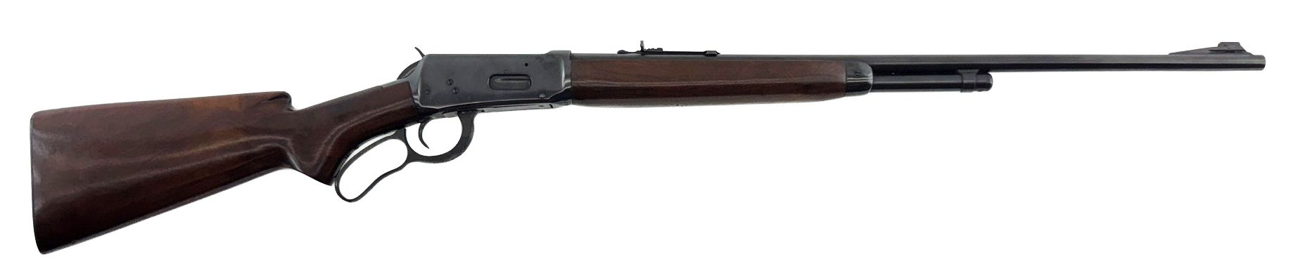 Side-view of a bolt-action rifle with wooden stock and black barrel on a white background