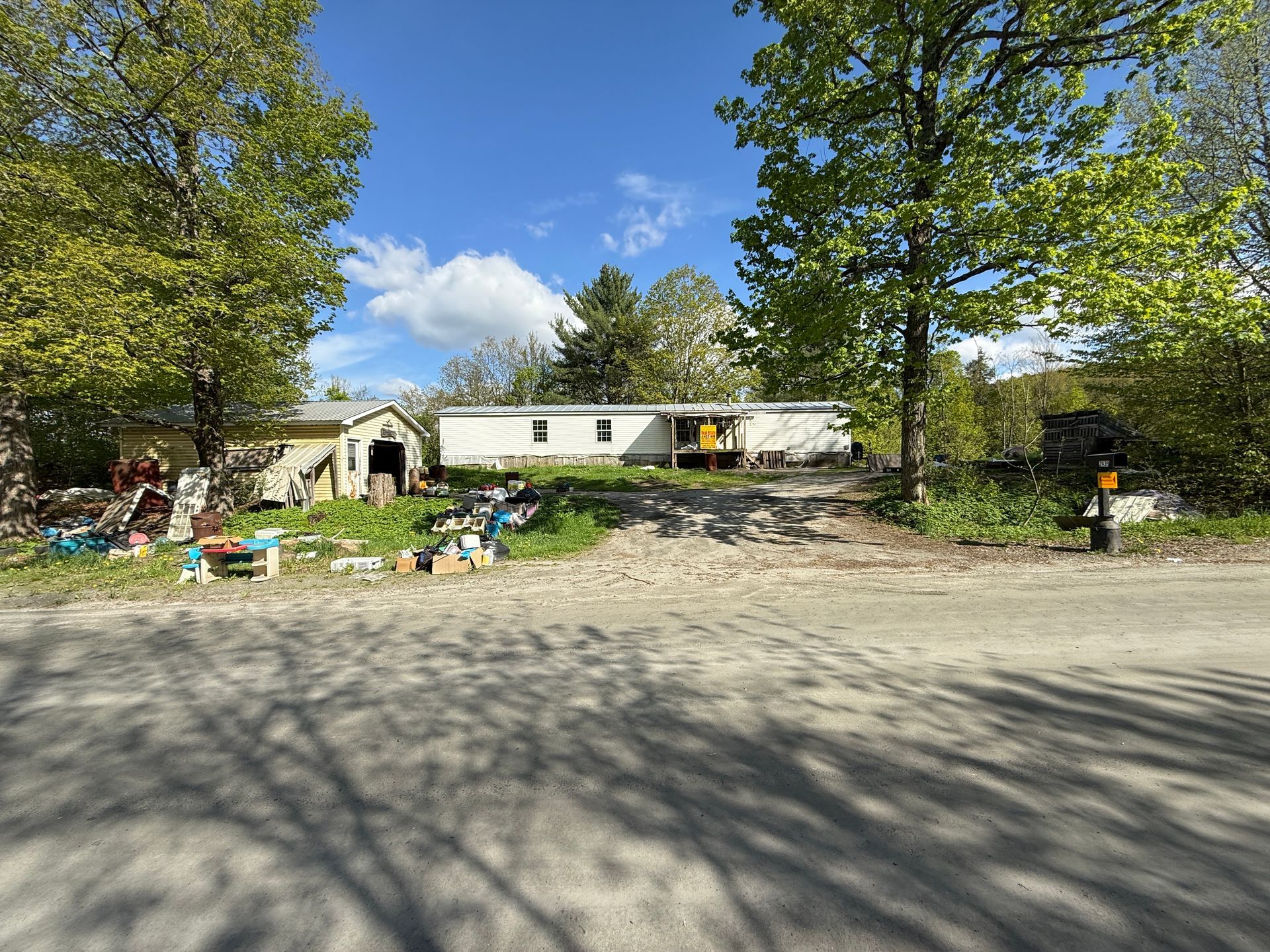 Mobile home on a grassy lot.