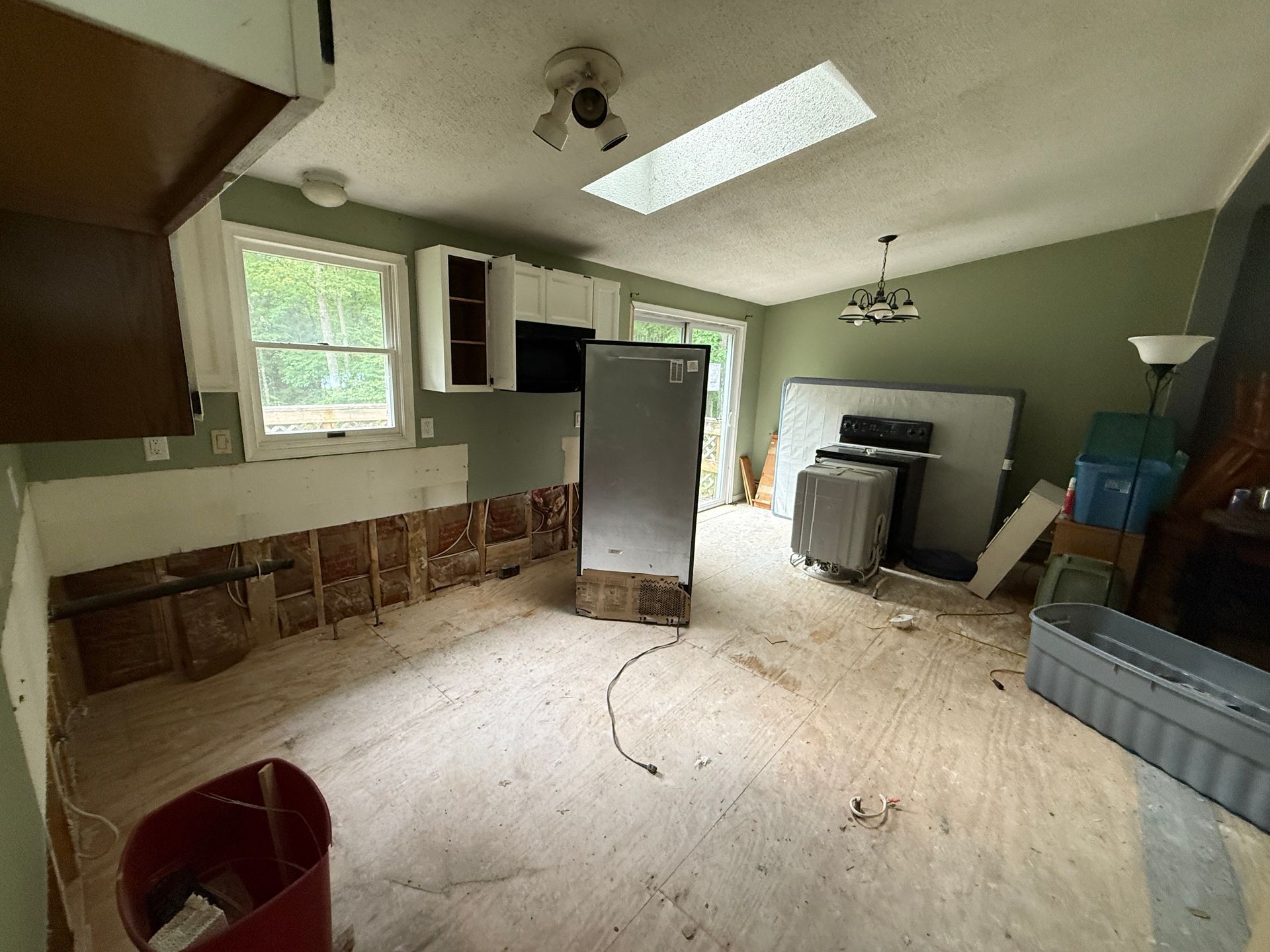 Kitchen with green walls.