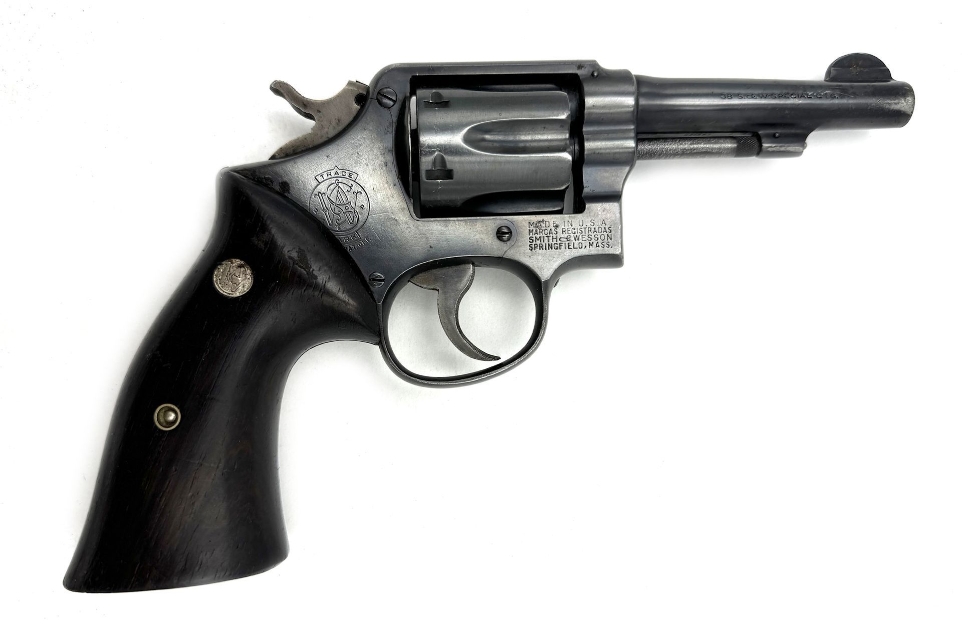 Black Smith & Wesson revolver on a white background.
