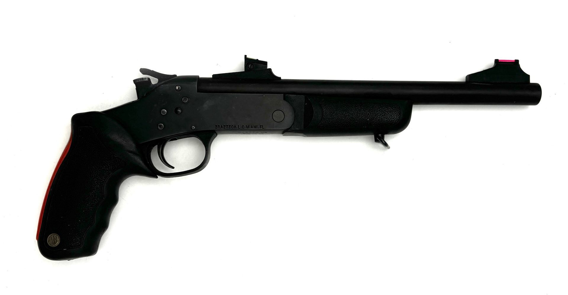 Black handgun with textured grip, red front sight, and barrel.