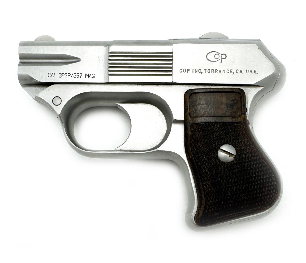 Small, silver CDP pocket pistol with black grip, on a white background.