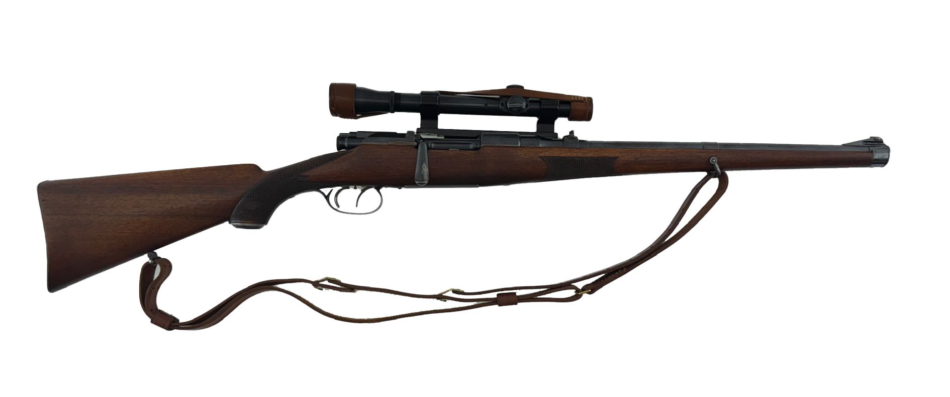 Brown rifle with a scope and a strap.