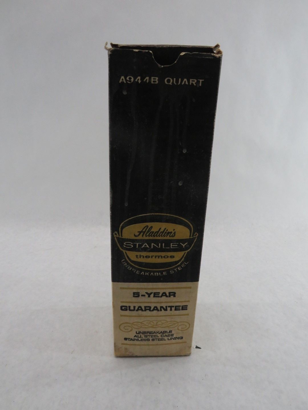 Black Aladdin Stanley thermos.