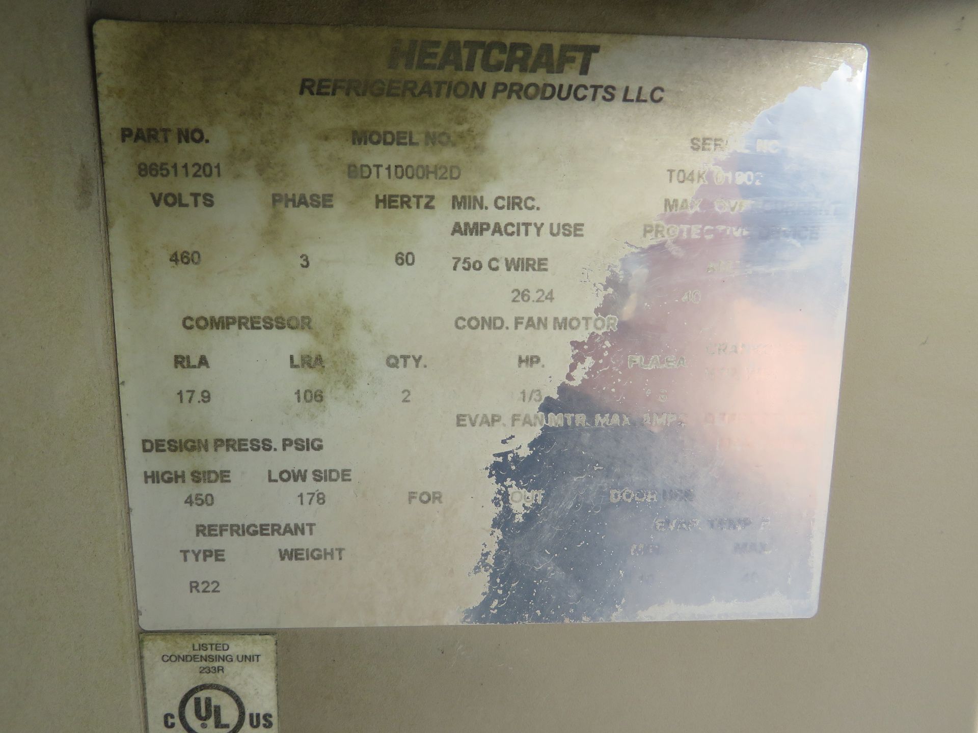 Data plate for a Heatcraft refrigeration product. Contains model, voltage, and other technical specifications.