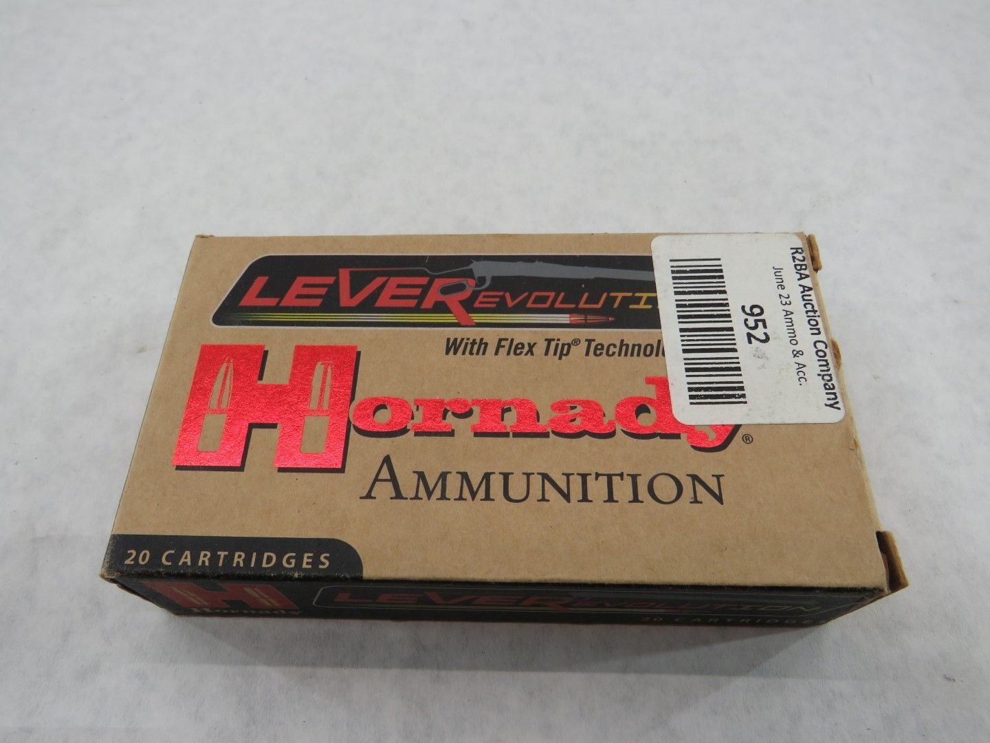 Box of Hornady Lever Evolution ammunition, brown with red and white text. Contains 20 cartridges.