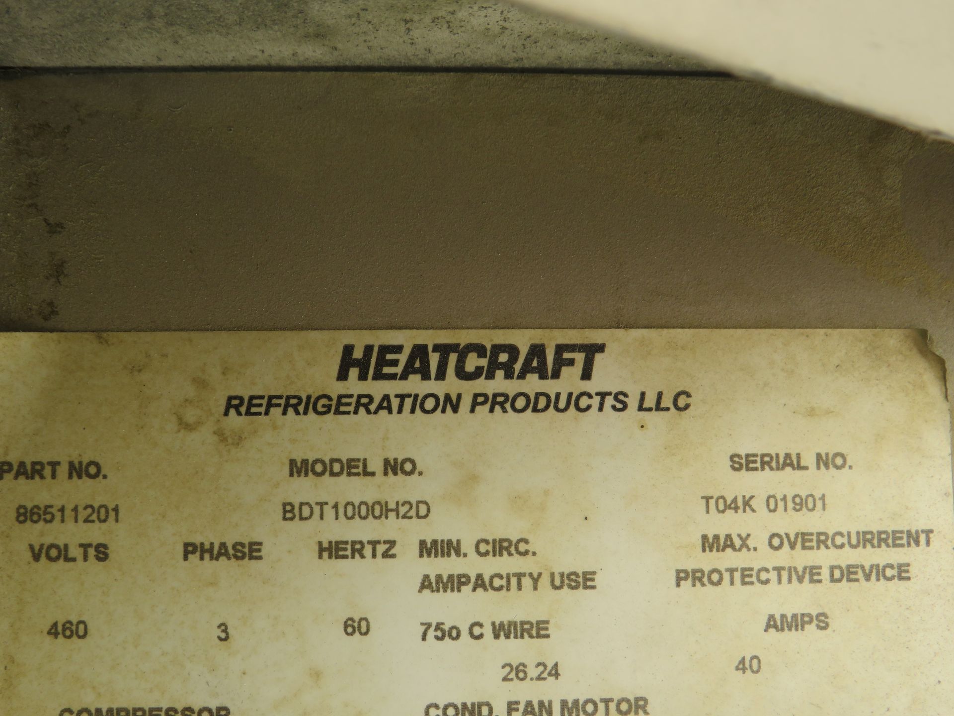 Label from Heatcraft refrigeration product with model and electrical specifications.