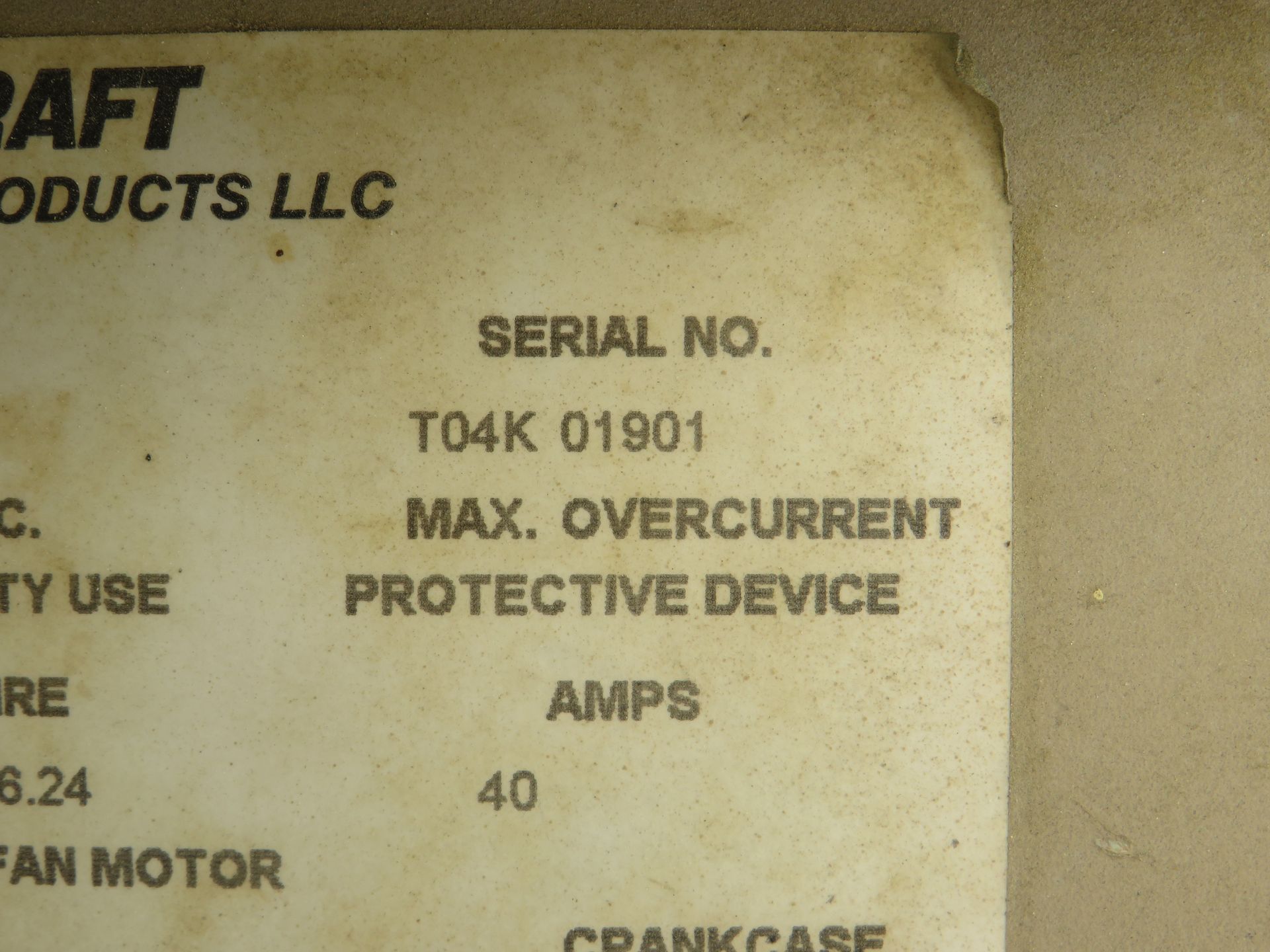 Close-up of a product label showing a serial number, maximum overcurrent, and 40 amps.