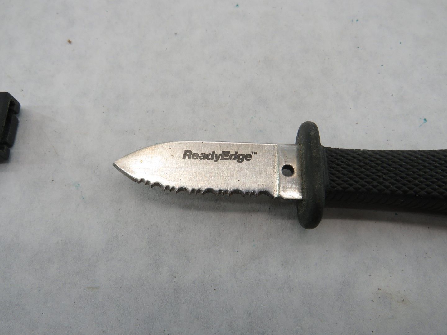 A small, serrated 